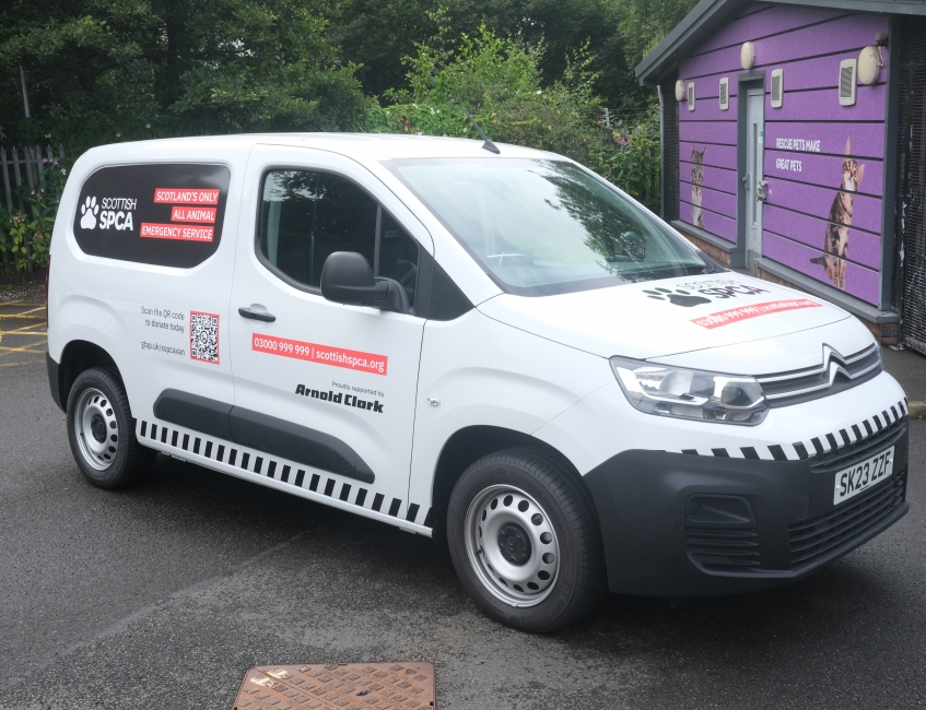 a white van branded with Scottish SPCA branding