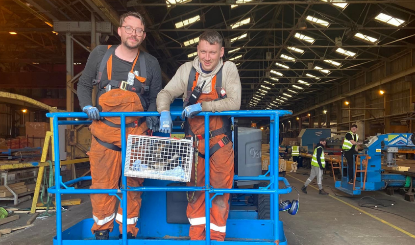 Robert and David from Glennon Brothers, Troon with rescued cat in carrier