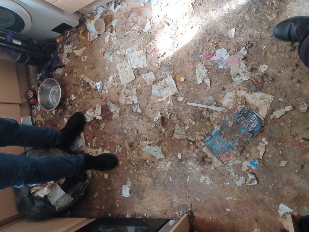 Image of dirty and faeces covered floor from the Cameron case
