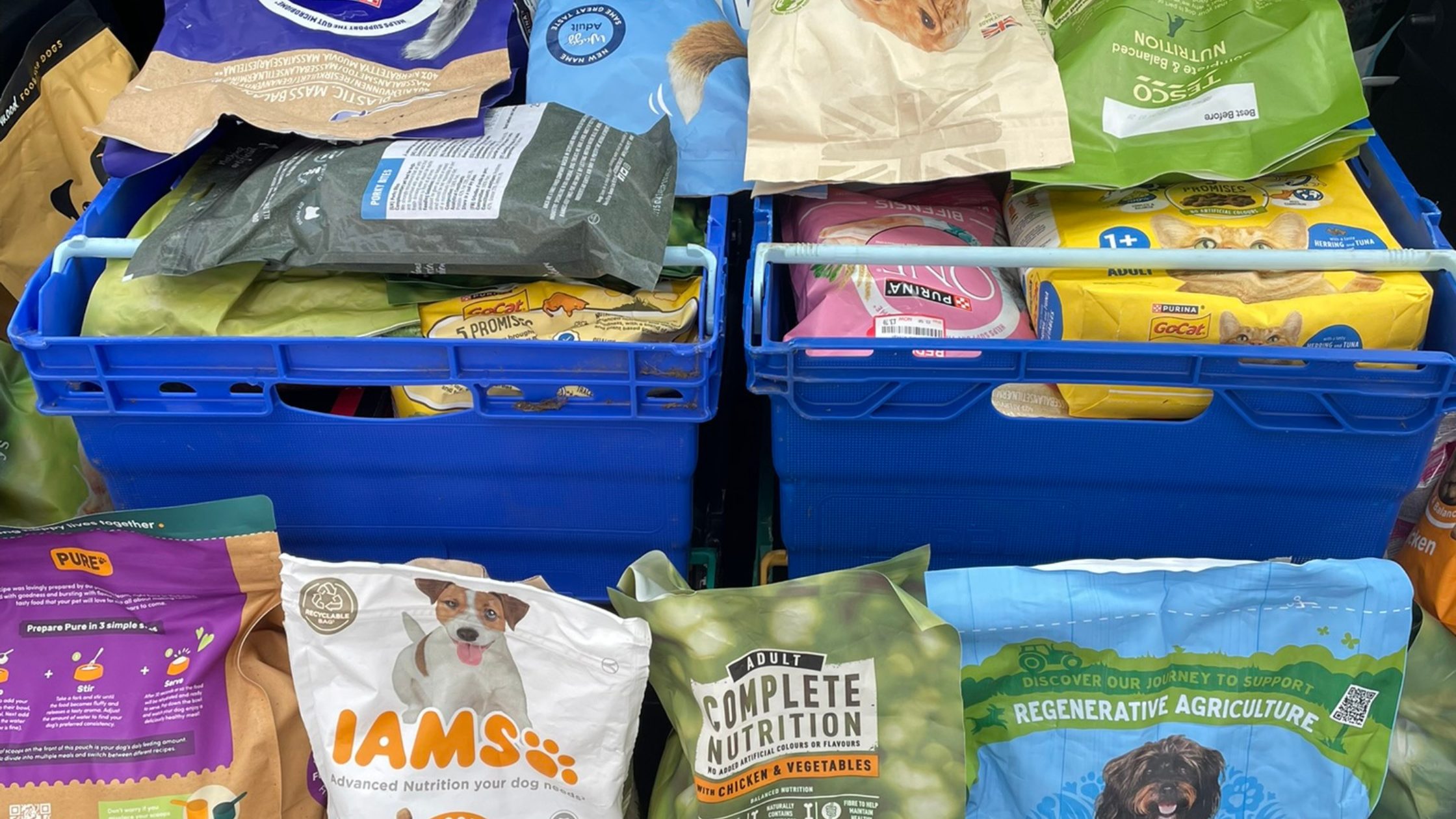 Image of dog and cat food bags in crates. Image to be used in article for record breaking donation for Fife foodbanks.